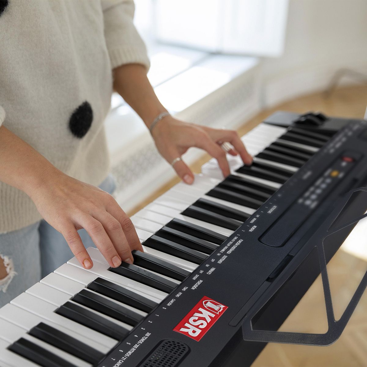 Teclado musical con metrónomo de 61 teclas luminosas